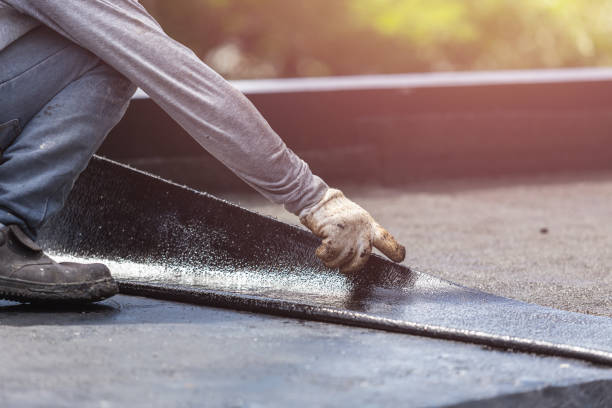 Professional Waterproofing technician working in Holbrook, NY